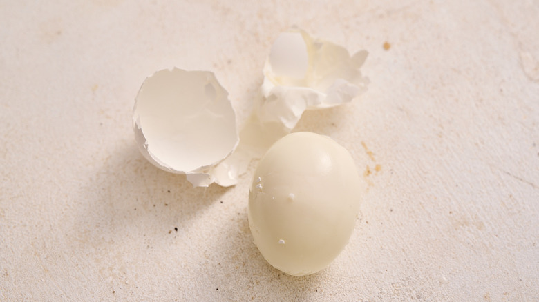 peeled hard boiled egg on a table