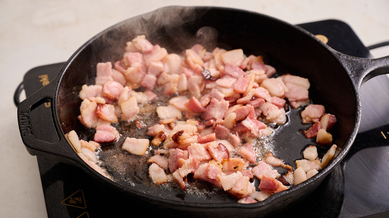 diced bacon in skillet