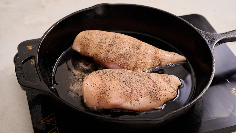 chicken breasts in skillet