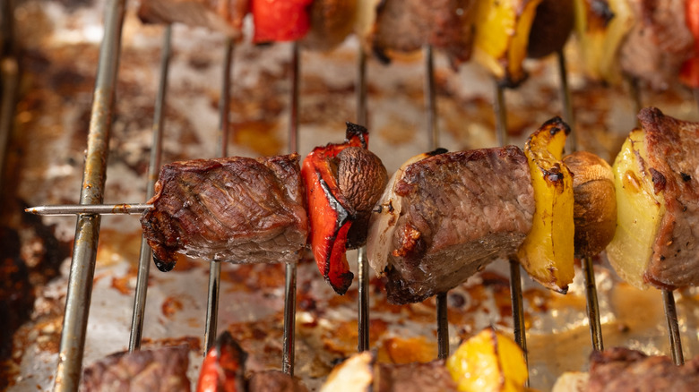 browned steak kabobs on tray