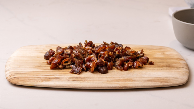 Chopped dates on cutting board