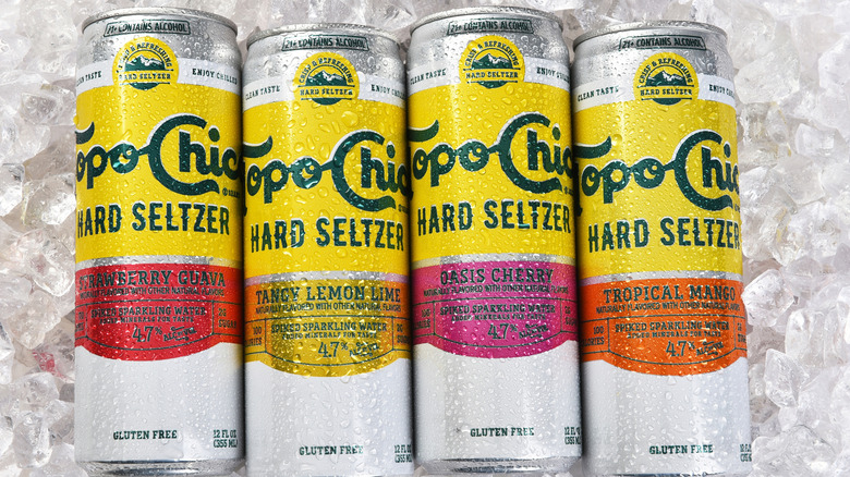 cans of topo chico over ice
