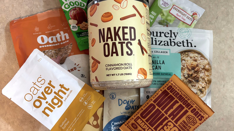 Variety of overnight oat mixes on a beige countertop