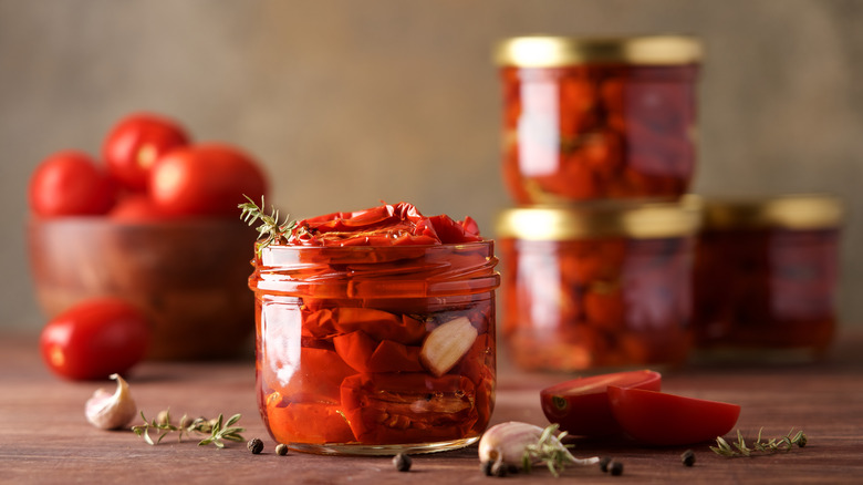sun dried tomatoes in jars of oil
