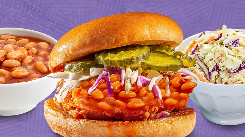 sandwich with beans and cole slaw sides