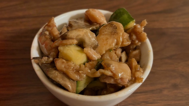 Mushroom chicken with zucchinni in white bowl