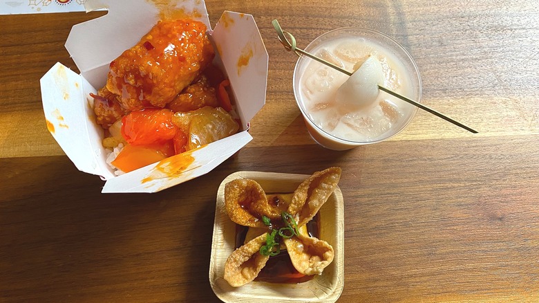 Panda Express Dynamite Sweet & Sour Chicken alongside other menu items on table