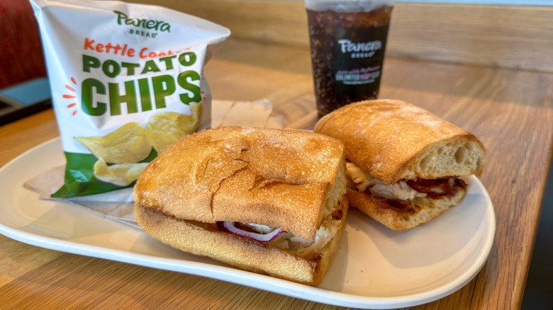Panera Bread sandwich with chips and drink