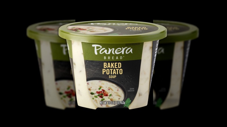 Panera Bread baked potato soup container on black background