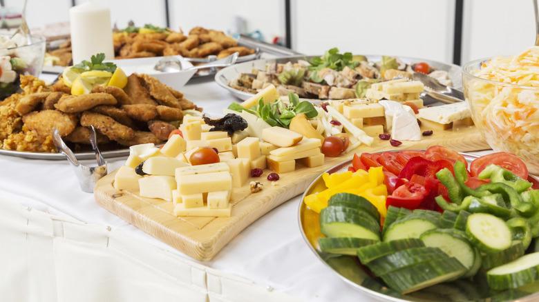 Full party spread of veggies, cheeses, and fried foods