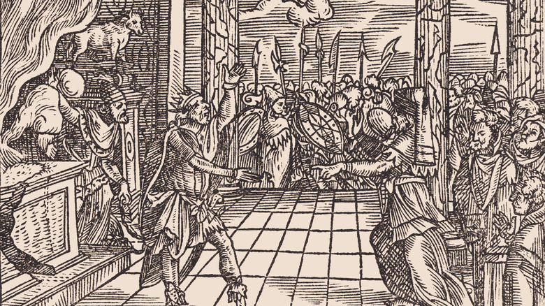 A woodcut image of a prophet accusing the biblical King Jeroboam of idolatry