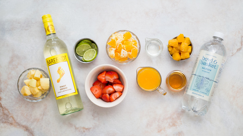 Passion fruit sangria ingredients on table