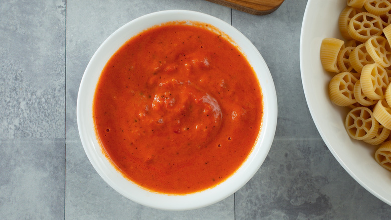 A bowl of pink pasta sauce