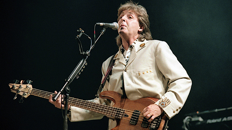 Paul McCartney playing guitar