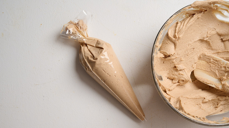 piping bag filled with peanut butter mixture