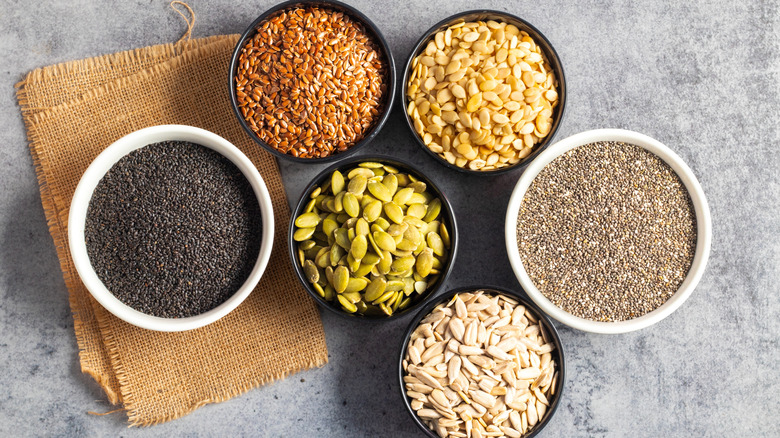 bowls of nuts and seeds