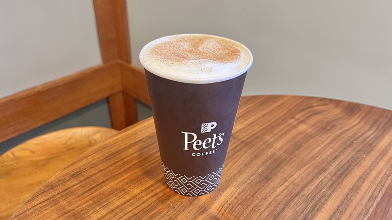 Havana cappuccino with cinnamon from Peet's on a wooden table