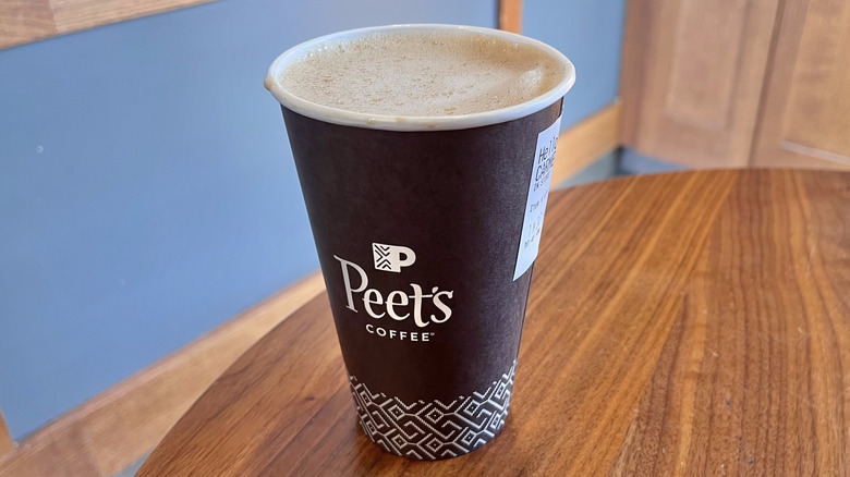 Horchata oat latte from Peet's on a wooden table