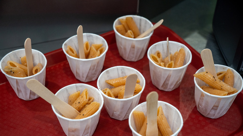 Pasta in portioned cups in a store
