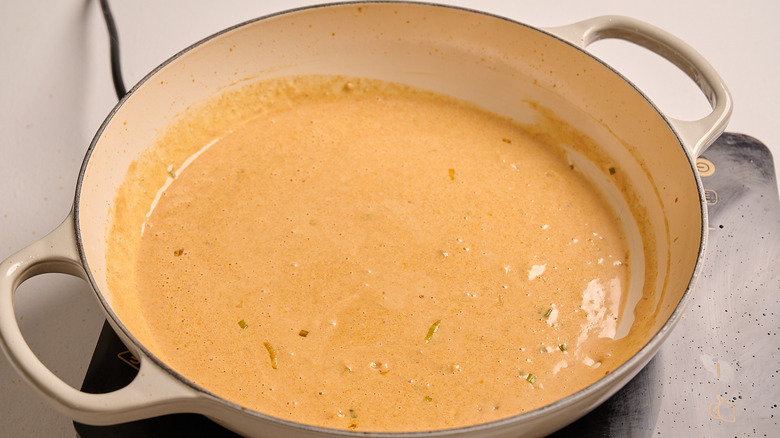 thickened cream sauce in a pot