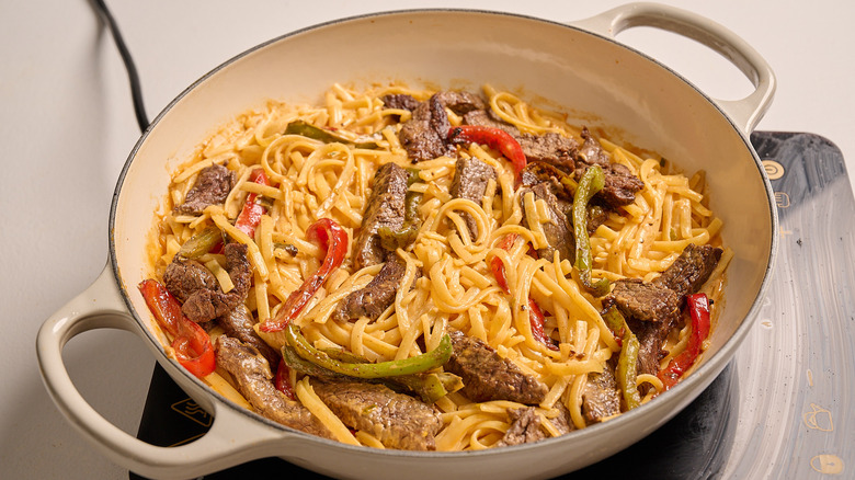 pasta tossed with steak and peppers