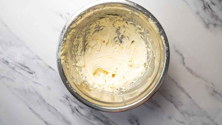 Buttercream in metal bowl