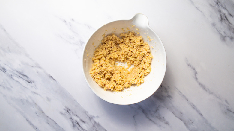 Mixed butter and sugar in bowl