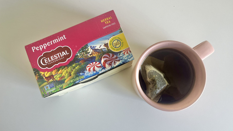 celestial seasonings peppermint tea in mug and box
