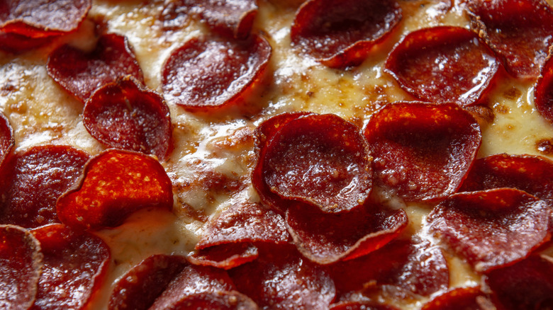 Close up pepperoni on pizza