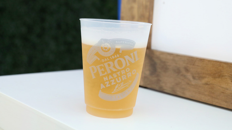glass of peroni beer