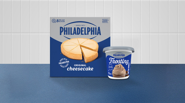 Box of the Phildelphia Original Cheesecake and a tub of the Cinnamon Cream Cheese Frosting on a table