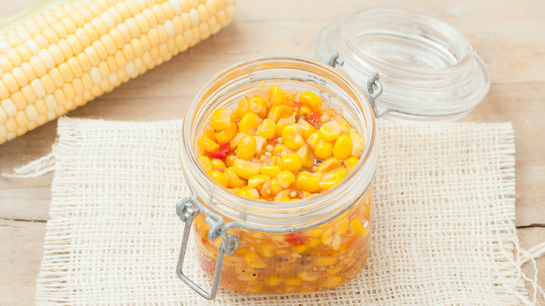 Jar of pickled corn kernels