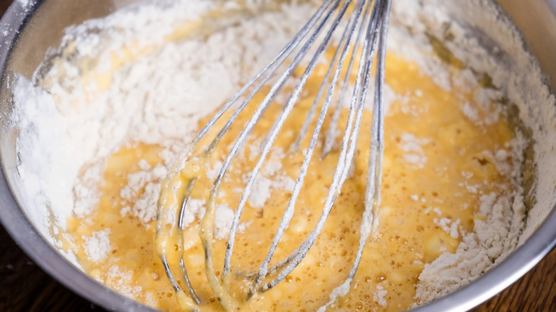 mixing up yellow cake mix