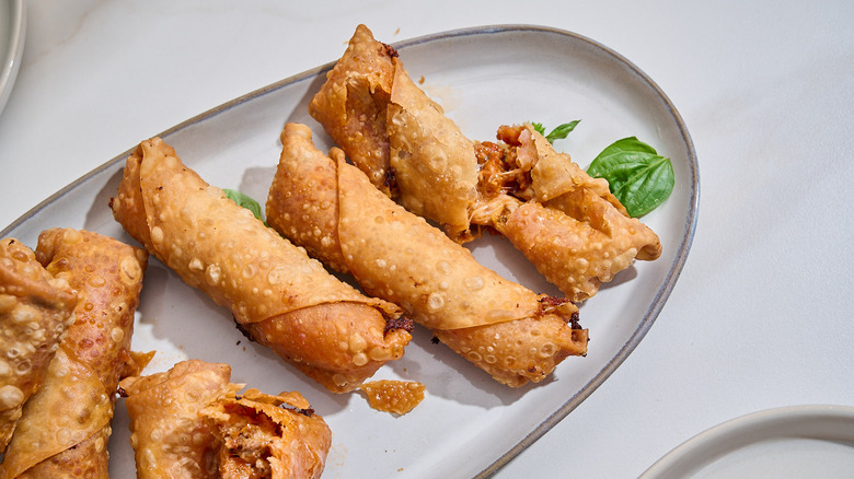 pizza egg rolls on a platter