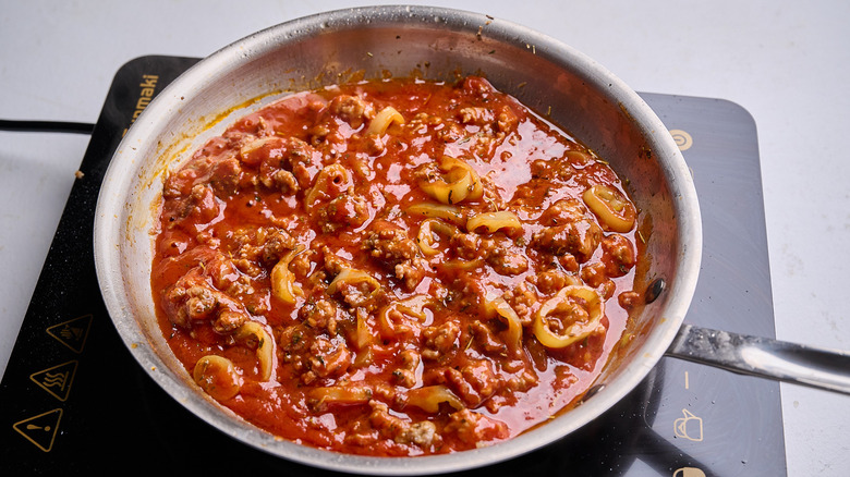 tomato sauce simmering in skillet