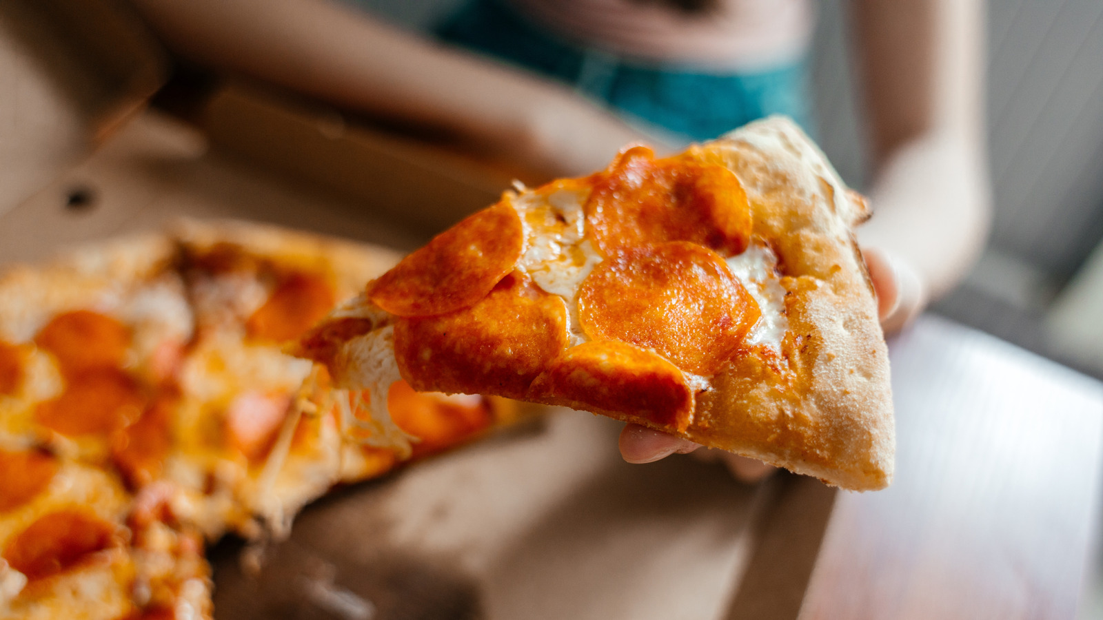 Get A Pizza Grease Stain Out Of Your Clothes With A Drop Of Something Already In Your Kitchen