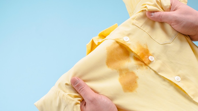 Yellow shirt with a pizza grease stain