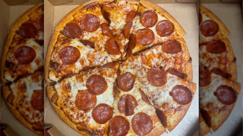 Pizza Hut pepperoni pizza with spicy marinara sauce