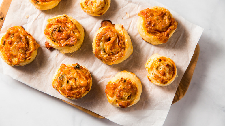 pizza pinwheels arranged on board