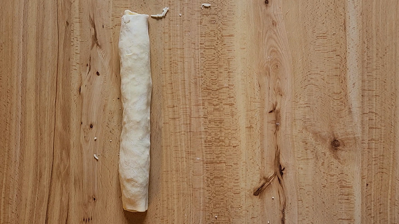 rolled up pastry on table