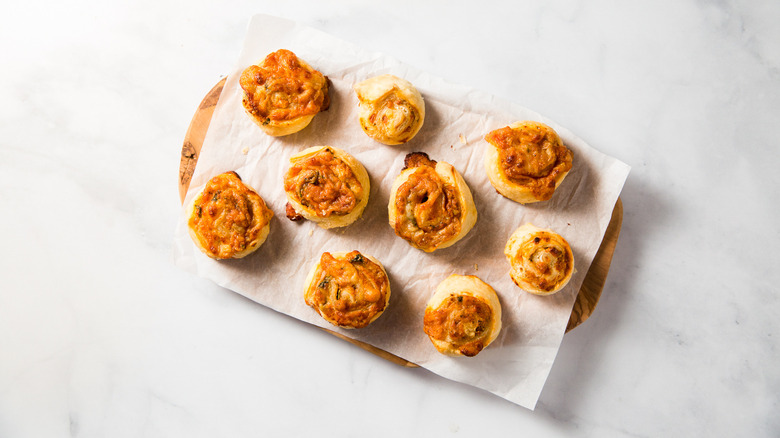 pizza pinwheels served on table