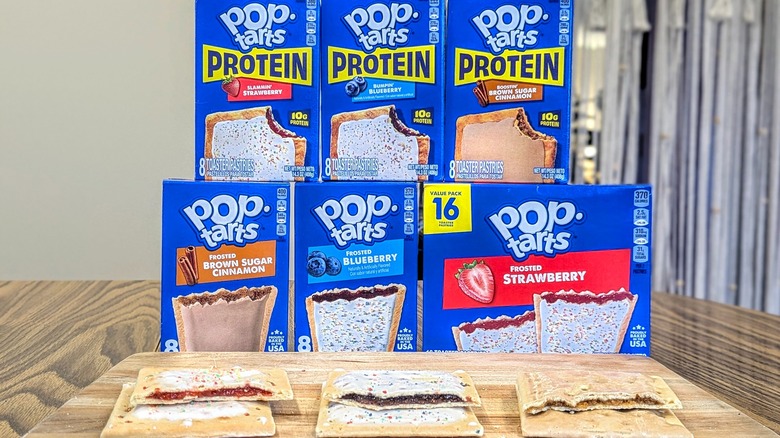 Six stacked boxes of Pop-Tarts behind unwrapped Pop-Tarts