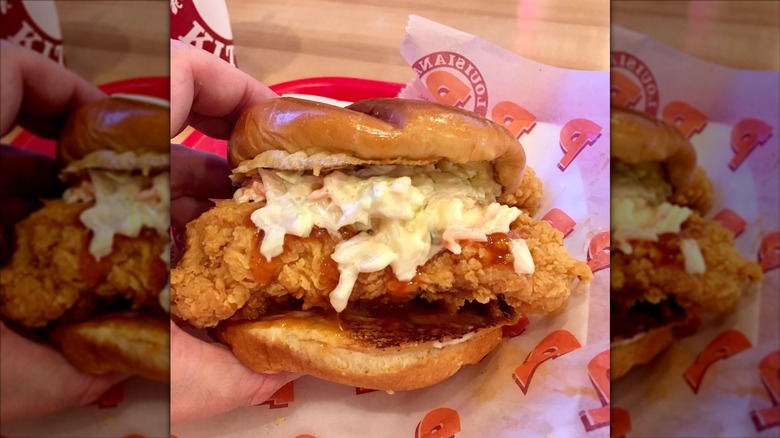 Popeyes chicken sandwich with coleslaw and voodoo sauce