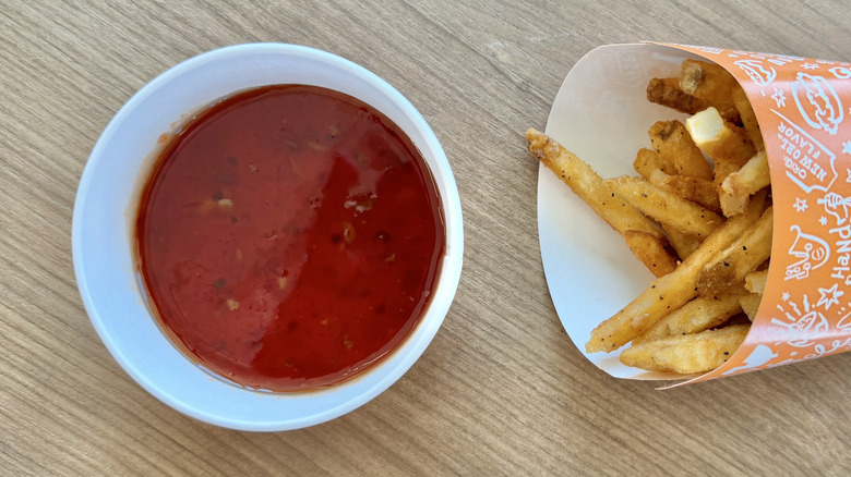 Open container of Sweet 'N Spicy Wing Sauce