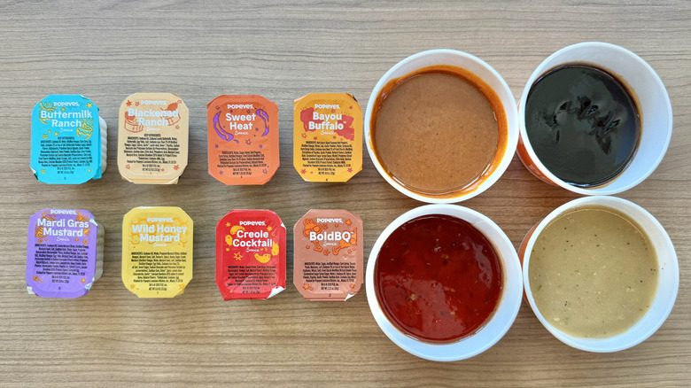 Top view of 12 Popeyes sauces