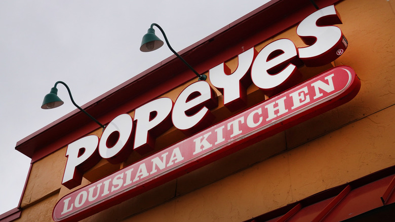 Popeyes Louisiana Kitchen sign on building facade