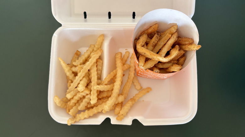 overhead view of crinkle cut fries in box