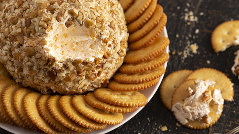 Cheese ball on a plate with crackers