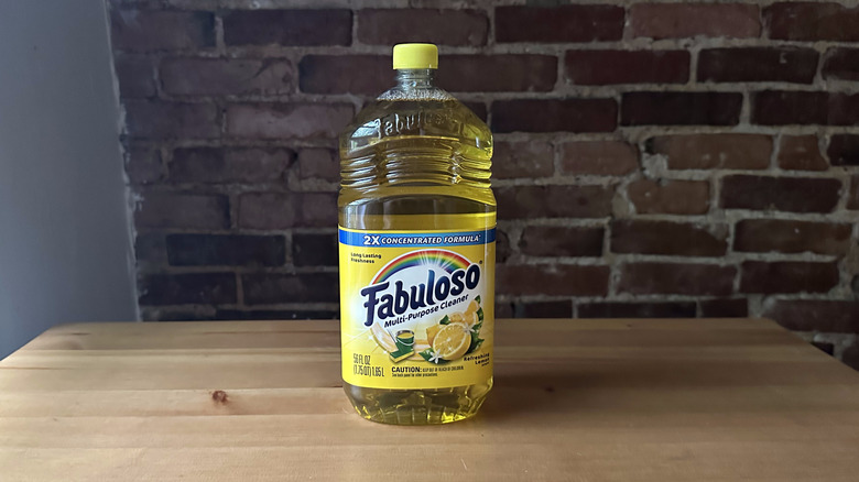 Fabuloso Refreshing Lemon cleaner on wooden table