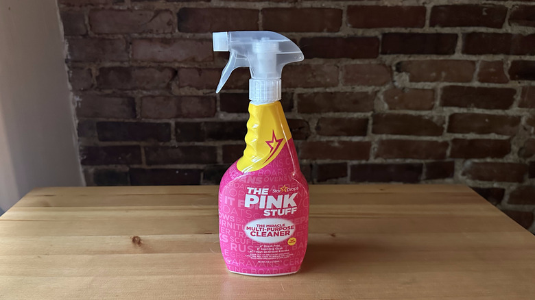 The Pink Stuff cleaner on wooden table